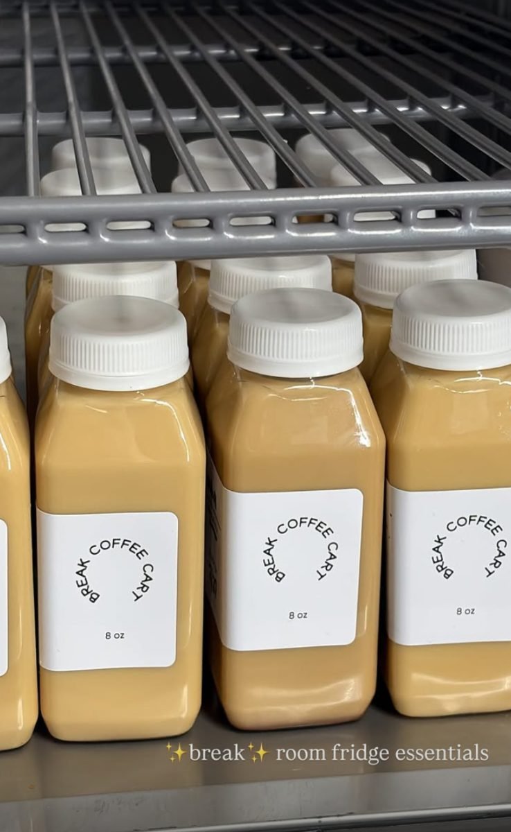 Break Coffee Cart bottled lattes with custom labels chilling in a fridge
